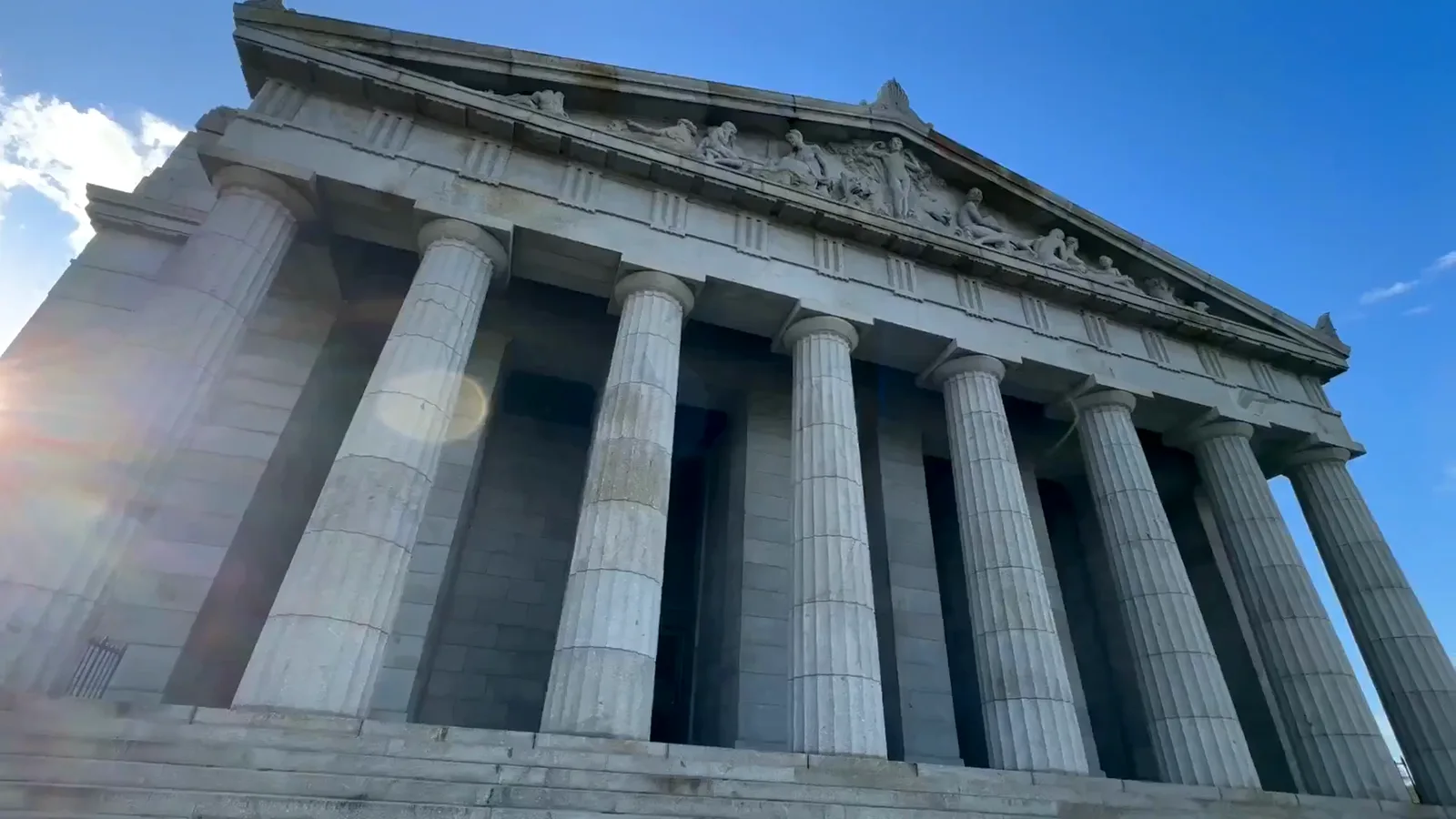 Neoclassical government building with carved stone columns photographed from below, standing in for the SEC's 2018 crackdown on ICOs Neoclassical government building with carved stone columns photographed from below, standing in for the SEC's 2018 crackdown on ICOs
