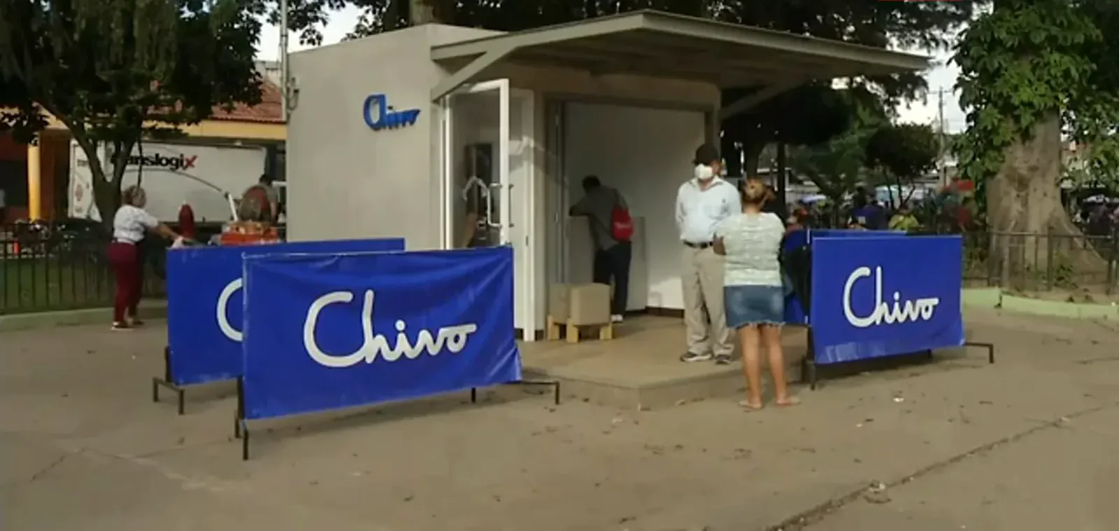 White Chivo bitcoin booth ringed with blue Chivo banners as Salvadorans gather to try the government wallet in the weeks after launch day White Chivo bitcoin booth ringed with blue Chivo banners as Salvadorans gather to try the government wallet in the weeks after launch day