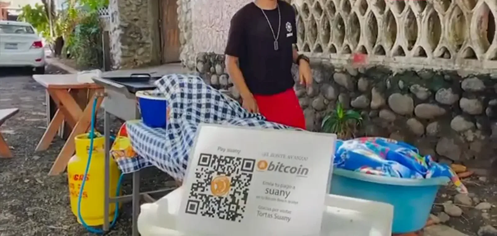 Street food stall in the surf town of El Zonte displaying a bitcoin QR payment sign for Tortas Suany, the village behind the Bitcoin Beach experiment Street food stall in the surf town of El Zonte displaying a bitcoin QR payment sign for Tortas Suany, the village behind the Bitcoin Beach experiment