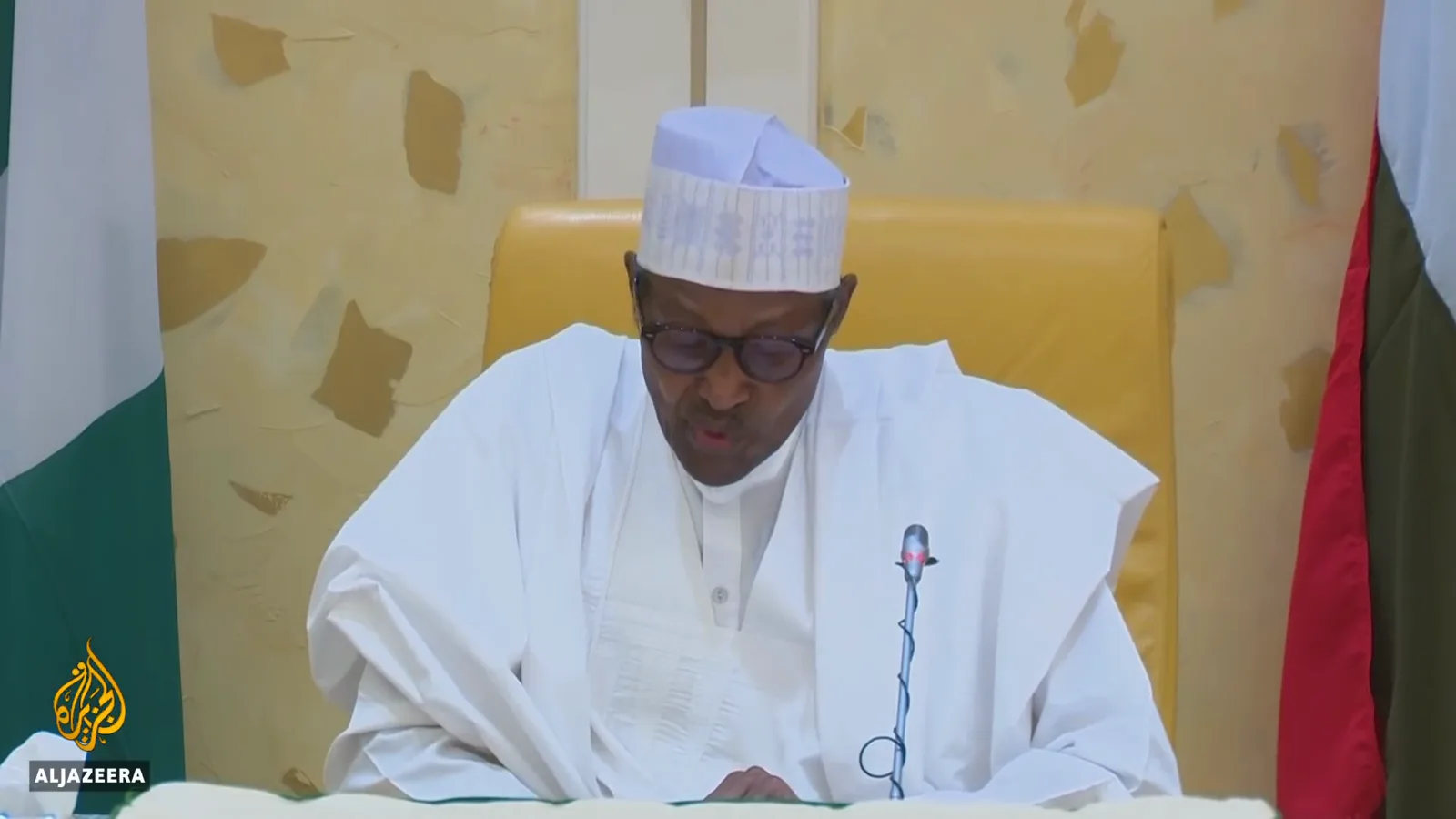 President Muhammadu Buhari reading the eNaira launch address at Nigeria's State House on October 25, 2021
