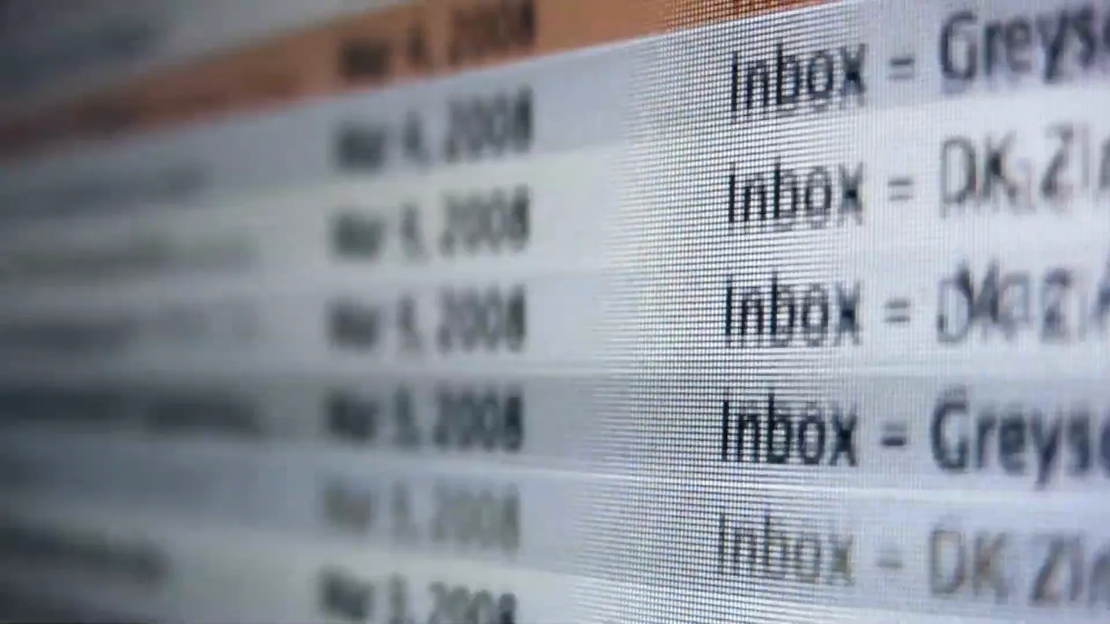 Close-up of a blurred email inbox listing messages from senders including DK Zi and Greys, where the booby-trapped offer letter landed Close-up of a blurred email inbox listing messages from senders including DK Zi and Greys, where the booby-trapped offer letter landed