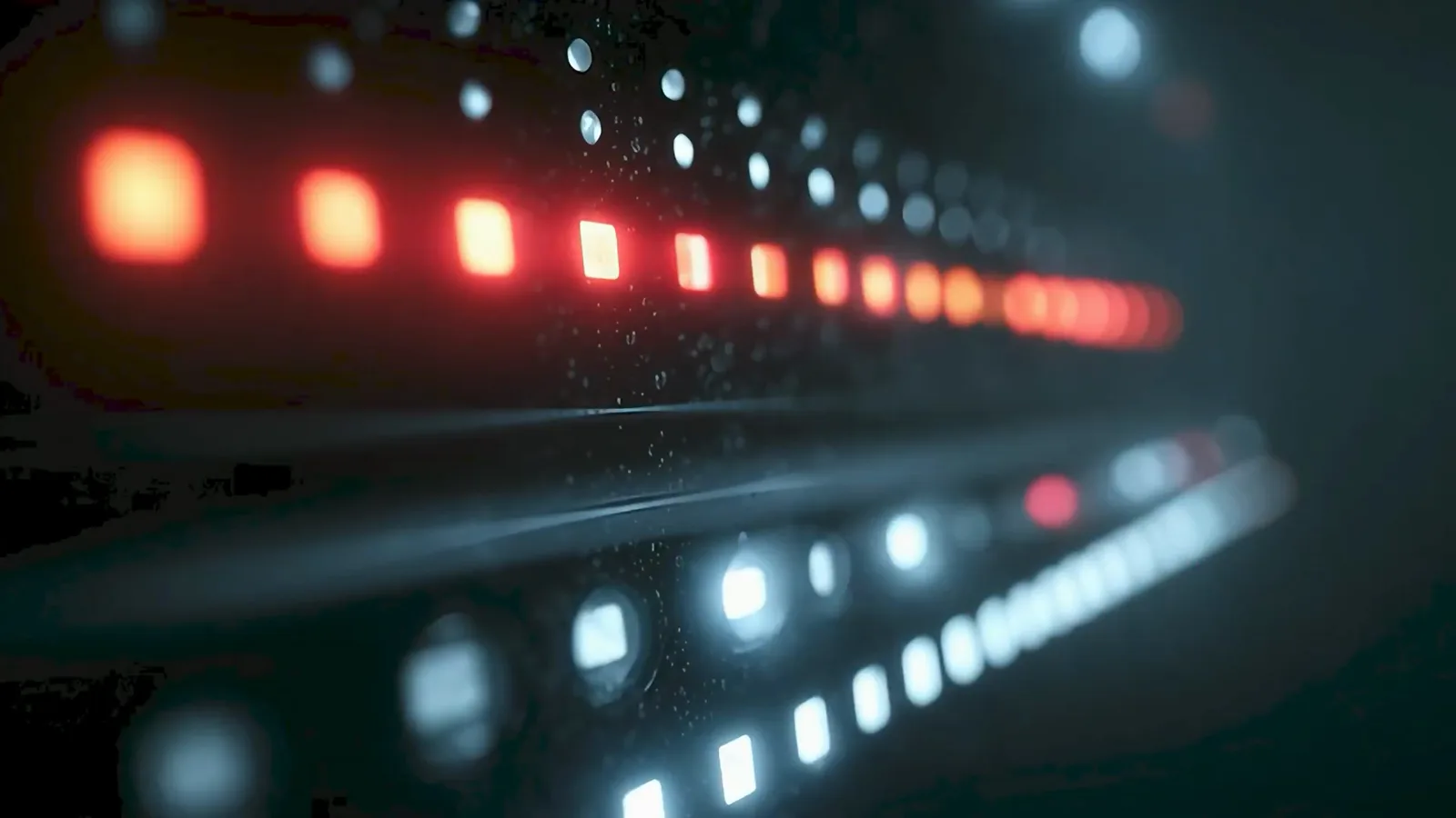 Row of glowing red and white server lights in a dark data center, standing in for the Sky Mavis machines holding four validator private keys Row of glowing red and white server lights in a dark data center, standing in for the Sky Mavis machines holding four validator private keys
