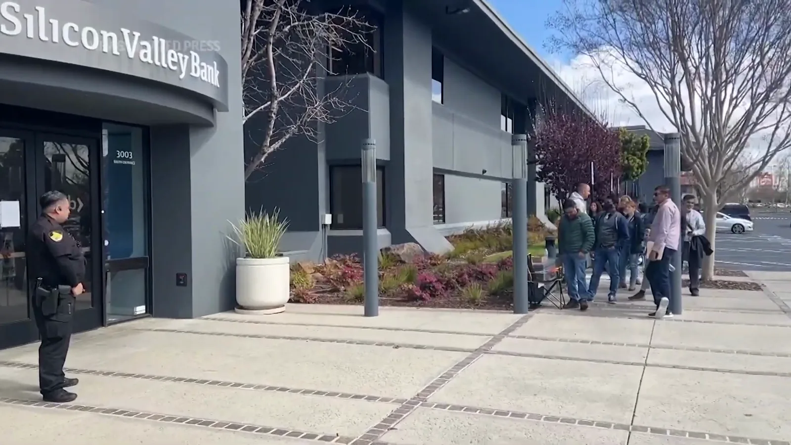 Depositors lined up outside the Silicon Valley Bank headquarters in Santa Clara as the bank reopened under FDIC control on Monday, March 13, 2023 Depositors lined up outside the Silicon Valley Bank headquarters in Santa Clara as the bank reopened under FDIC control on Monday, March 13, 2023